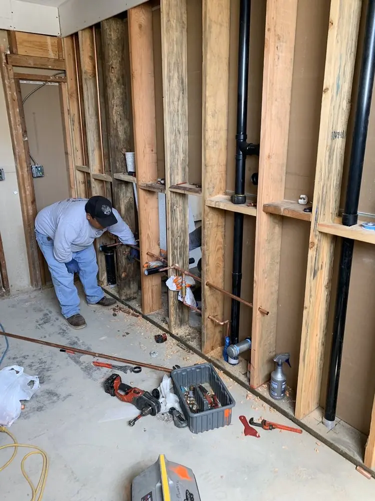 Commercial rough-in plumbing for Water Heater Replacement in West Side